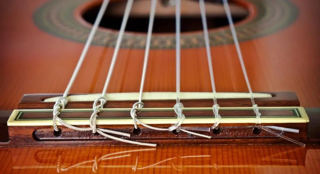 How to set the strings on an acoustic guitar: step by step instructions, tips